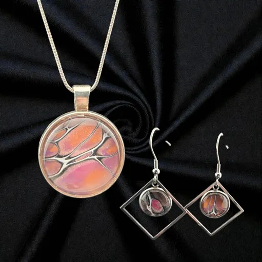 Fluid art pendant necklace with matching diamond drop earrings